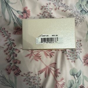 Anne klein’s Gold tone bangle set.